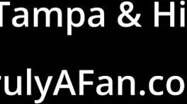 Teen brunette giggles as her feet get wet at the beach on beat2feetcom.