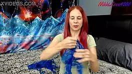 Tracy reviews her sexy redhead lingerie outfit, showing off petite body, naughty panties, and ass in bra