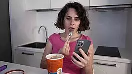 Darcy dark eats ice cream in kitchen while masturbating her pussy