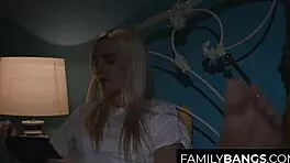 petite teens share midnight kisses in family setting