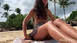 Girl flashes her pussy without panties while eating sushi on a crowded public beach