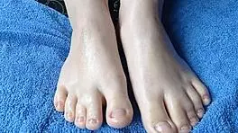 Adorable Oiled Feet Close-Up