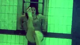 Katya Okuneva is at the pool, bouncing her tits in a dress and bikini