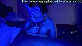 Asian woman performs sloppy deepthroat blowjob on big black cock, her big tits bouncing.