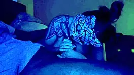 Asian woman performs sloppy deepthroat blowjob on big black cock, her big tits bouncing.