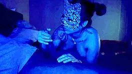 Asian woman performs sloppy deepthroat blowjob on big black cock, her big tits bouncing.