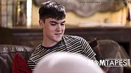 Son Admires Mom's Rear View On Sofa