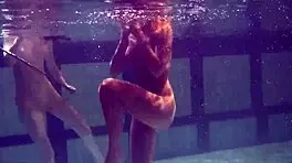 underwater lesbian bathing turns steamy on beach