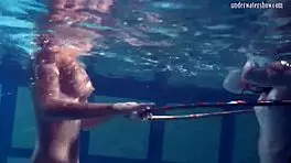 underwater lesbian bathing turns steamy on beach