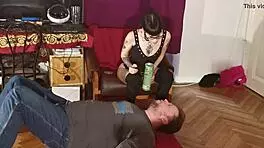 Slim goth domina feeds slave mouth to mouth