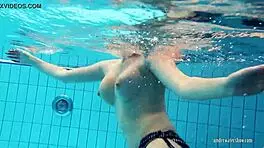 redheaded katrin teasingly stripping underwater 😏