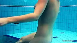 redheaded katrin teasingly stripping underwater 😏
