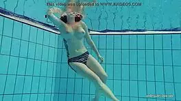 redheaded katrin teasingly stripping underwater 😏