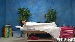 Sexy 18-year-old babe gets a massage