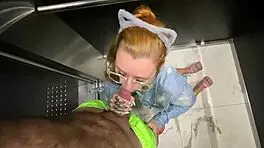 Naughty Neighbor Sucks Cock in Elevator for Doorman to See