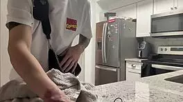 Young 18+ thug with tattoo twerks big ass in kitchen shorts, hairless close-up amateur dancing