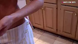 Both young girls take a cock in the kitchen