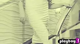 Emily bloom poses seductively, showing shaved pussy and big ass.