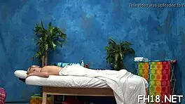 the masseuse gets fucked hard on the table by the dominant guy