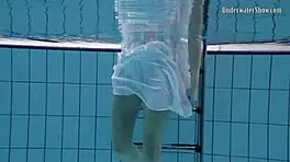 aqua girl andrejka strips underwater in pool