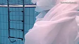 aqua girl andrejka strips underwater in pool