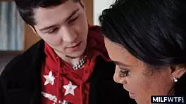 An experienced asian milf seduces a young guy in a taboo mother-in-law encounter, showcasing her big tits and mature allure.