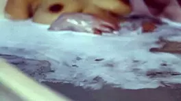 student passionately kissing boyfriend in apartment, night full of intensity and connection