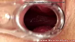 Puffy peach teen 18+ explores herself using a speculum toy.