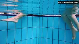 bubarek and birtakik splash and tease each other underwater in the pool, brunette teens in bikinis