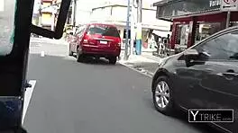 Asian teen in black leggings meets backpacker on the street