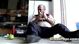 in the dimly lit room, the desirable blonde babe craved the old man's cock, sucking it eagerly while he played with her shaved tits