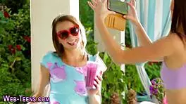 Teen in stockings intensely tastes lesbian pussy outdoors