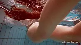 Hot brunette Lola shows off big tits in steamy scene