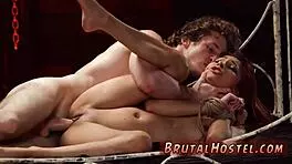 Poor little Jade Jantzen's ass gets gaped while men slave over her feet in extreme bondage