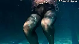 Lozhkova bathes in see through shorts in the pool