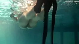 Lozhkova bathes in see through shorts in the pool