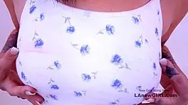 Hot brunette squirting from fuck machine between her legs.