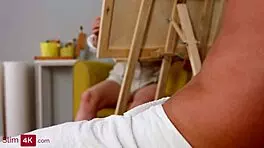 Polly White, the slim artist, enjoys anal, blowjob, and shaved pussy fingering with her male model in a steamy session.