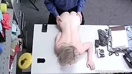 Old guard exploits a young 18+ thief. He forces rough action in the shop after catching her.