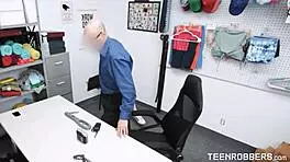 Old guard exploits a young 18+ thief. He forces rough action in the shop after catching her.