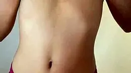 Samary, a sexy 18-year-old, records herself in the bathroom without underwear, showing her natural tits.