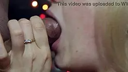 wife gives close-up attention to friend under romantic lights