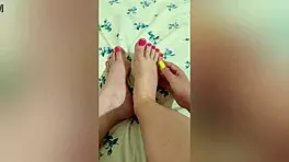 shy babe strokes legs in shower on phone