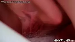 Cutie brunettes in lingerie kiss passionately before fucking shaved pussies.