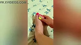 Young Babe Strokes Sexy Feet With Pink Pedicure