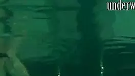 brunette teen kristina andreeva enjoys a naked swim in the pool, showing off her tight body.