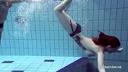 Bushy and round ass girls strip and swim in pool, beach, and outdoor areas