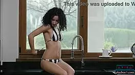 Hungarian petite milf housewife Luca Miklosi strips down for a solo Playboy softcore shoot.