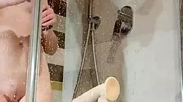 Why does this slut fuck her ass with a dildo in the shower?