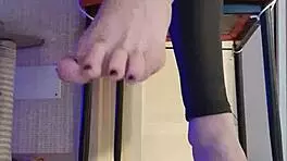 Dirty slut in black leggings fondles her fingers 😈👅